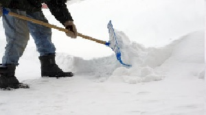 Snow Shoveling. Winter Aches and Pains.